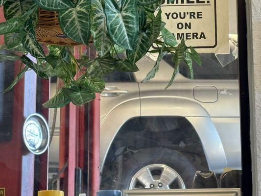 car on rack during inspection.