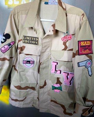 Custom camo jacket. Designer patches sewn.