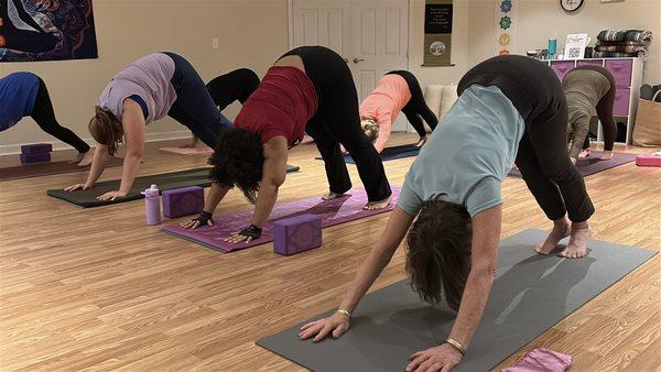 Vinyasa classes at My Happy Yoga Place are modified to each student's level.