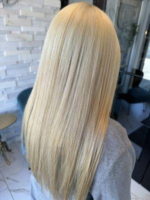 9AM-1PM double process blonde touch up on previously highlighted hair with a trim $140