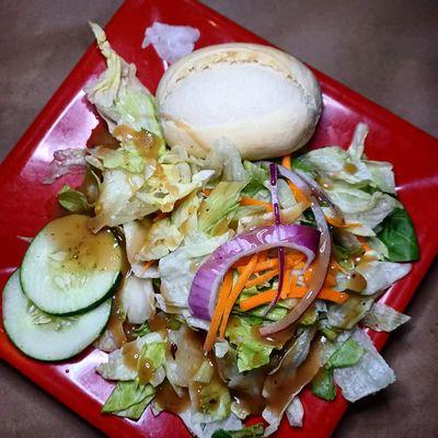 Salad with roll. Roll was housemad and good