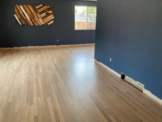 This is the floor right after they finished, we hadn't put the baseboards on, but you can tell it is TOP QUALITY refinishing!