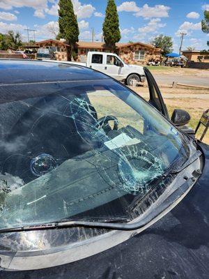 Image of windshield needing to be repaired.