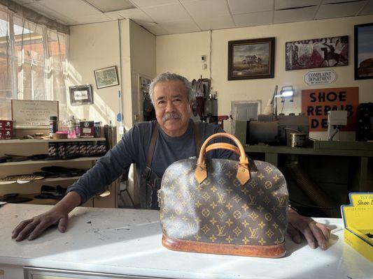 Mr. Javier Barrios and our repaired Louis Vuitton.