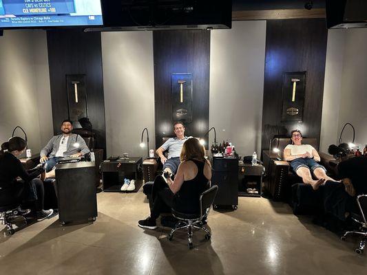 Hand and foot room getting sports pedicure.