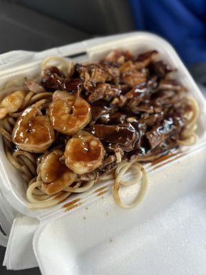 Teriyaki chicken, beef and shrimp super combo with noodles.
