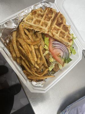 Cheddar Bay waffle fish sandwich with fresh hand cut fries.