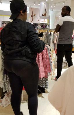 This is an employee..I hope shes not wearing the size jacket you need. Also shes demonstrating why leggings are not pants!!!