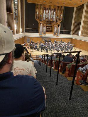 From row S near the back