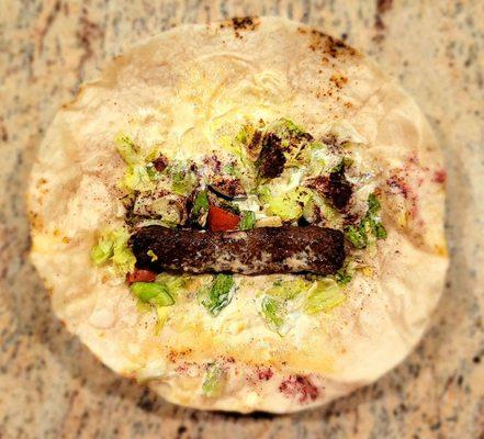 The total contents of the Beef Wrap.