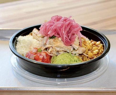 Almost Legal Bowl: Chicken, Spicy Slaw, Avocado, Plantains, Grilled Corn, Pico de Gallo, Queso Fresco, Pickled Onion, Sriracha Aioli;