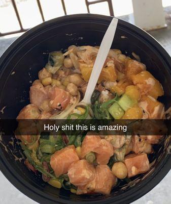 Spicy Salmon Bowl. (Cucumber, garbanzo beans, mango, seaweed, poke sauce...)