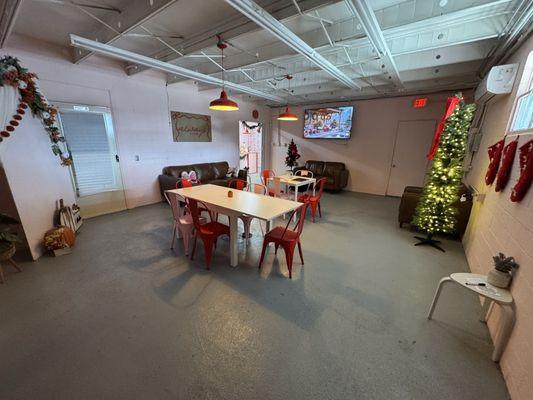 Space in the back, past the coffee bar.