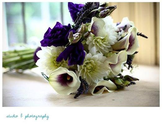 A bridal bouquet of Dahlia, Lavender, Roses and Eustoma, an original Artiflora design.