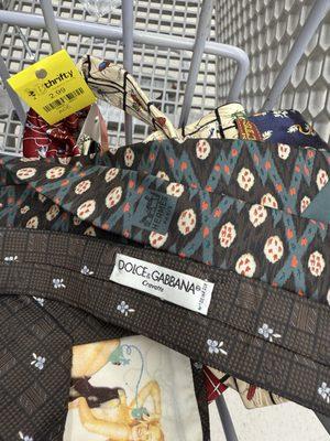 Hermes & Dolce for three bucks. Heck of a deal. Their ties are stapled together and you get two for three bucks. Major score!!!!