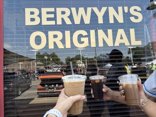 Outside with a latte and iced coffees