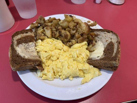 Side order of 2 eggs any style, home fries, and choice of toast, $9