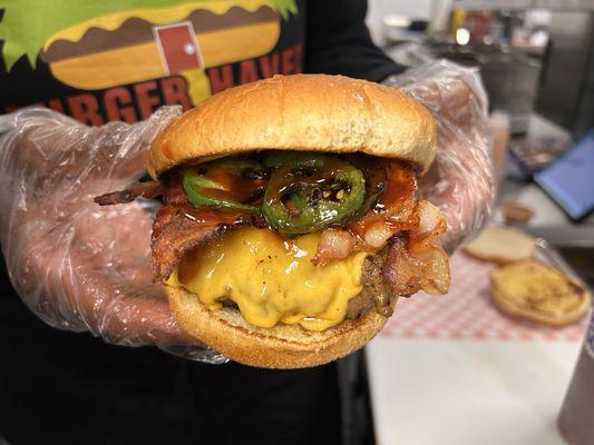 Sweet Heat Burger 1/2 lb burger, bacon, cheddar, grilled jalapeno,house bbq .