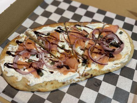 Salmon, capers, and cream cheese flatbread pizza