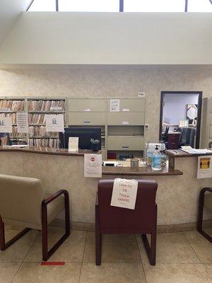 Front office with Covid rules.