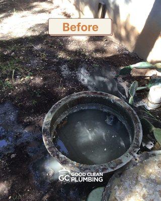 Grinder pump pit was flooded and overflowing due to pump failure, risking property damage.