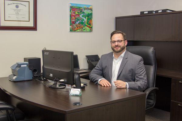 Attorney Geoff Levy working in the office