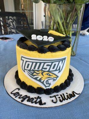 Towson University Cake for 6. Yellow fondant with black piping around the top and bottom. Customized with my name, Logo, and graduation cap