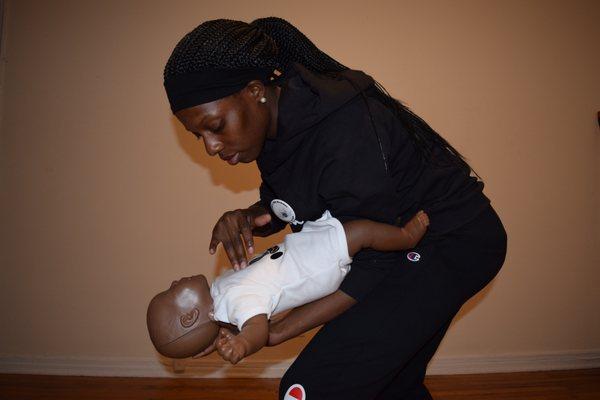 Choking Infant skill in progress.
Cendra J.