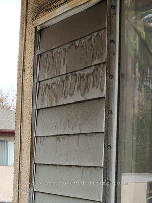 Ash covered window and wall