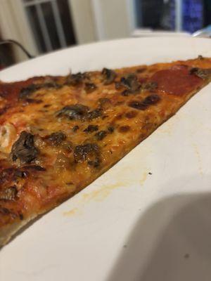 Not even crisp on the bottom. It's a floppy piece of dough and the mushrooms are chopped to oblivion.