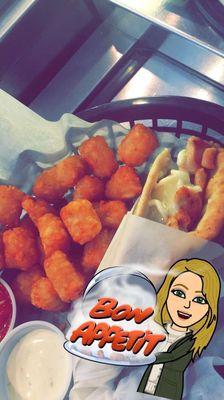 Chicken philly on pita with tots, yum!