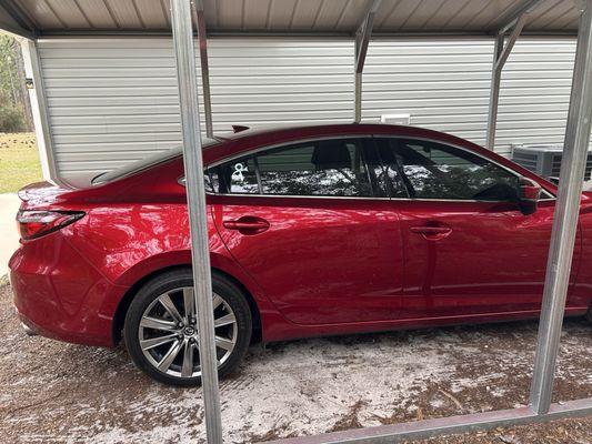 Windows tinted and car clay bar waxed.