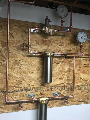 A complete Domestic water filter installation with pressure reducing valve & pressure gauges