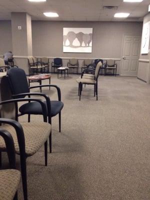 The waiting area is large, open and comfortable with plenty of room to sit and plugs for charging my phone and iPad. No wifi