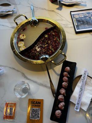 Spicy and non spicy hot pot.