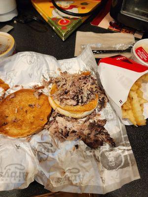 Quarter Pound Pulled Pork Sandwich Look how small the bun and sandwich are. Definitely not a quarter pound of meat.