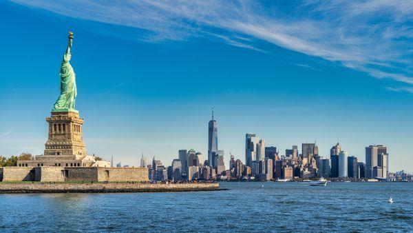Statue of Liberty and New York Skyline.