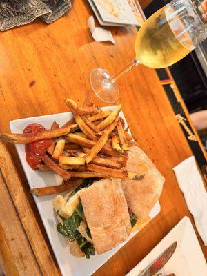 Lemony tofu and kale sandwich with french fries...