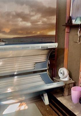 The tanning bed, with hi-velocity fan to keep you nice and cool, & other amenities. This is our current location in Kahului on Amala Place.