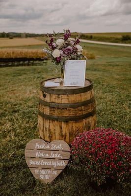 Wedding flowers: Mums & barrel decoration Wedding Rental: Whiskey barrel