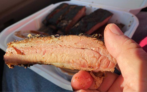Yummmmm! Beautiful bark, juicy rib, falling off the bone. Sauce? Who needs sauce?