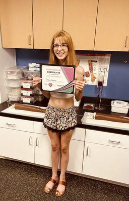 A Nurturing Hands Medical Assistant Student Receiving Her Upon Completion Certification.