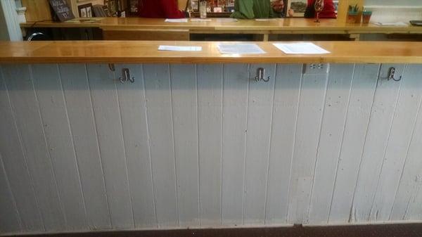 Belly up to the bar and place your wine order.