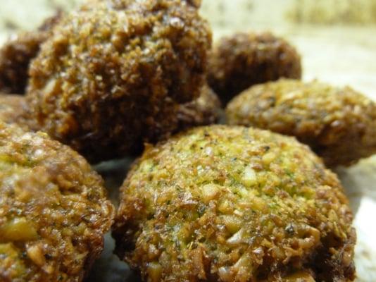 Hot fresh vegan Falafel right out of the oil for you to eat at the Farmers' Market on it's own, in a wrap, or on a plate.