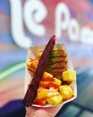 Lime paleta with tajin, chamoy and pineapple