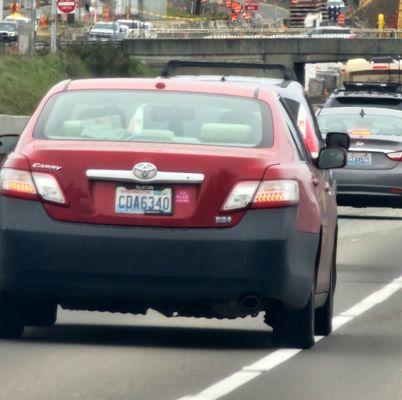 Tailgating and in carpool and almost hit the other car. 1 driver