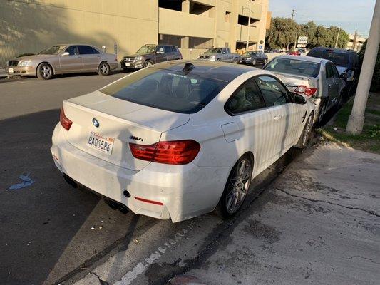 2018 BMW M4 in for front and rear end body repair.