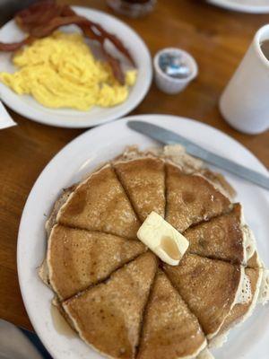 Banana Pancakes with scrambled eggs and hard crispy bacon