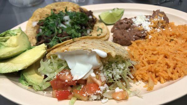 Al pastor gordita and steak taco with rice/beans