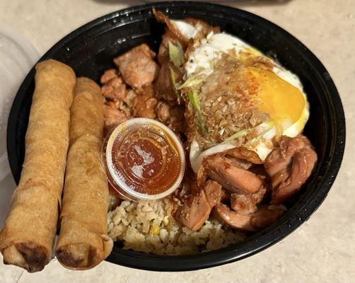 Delectable Pinoy boi fried rice with bbq chicken as protein, fried egg, lumpia